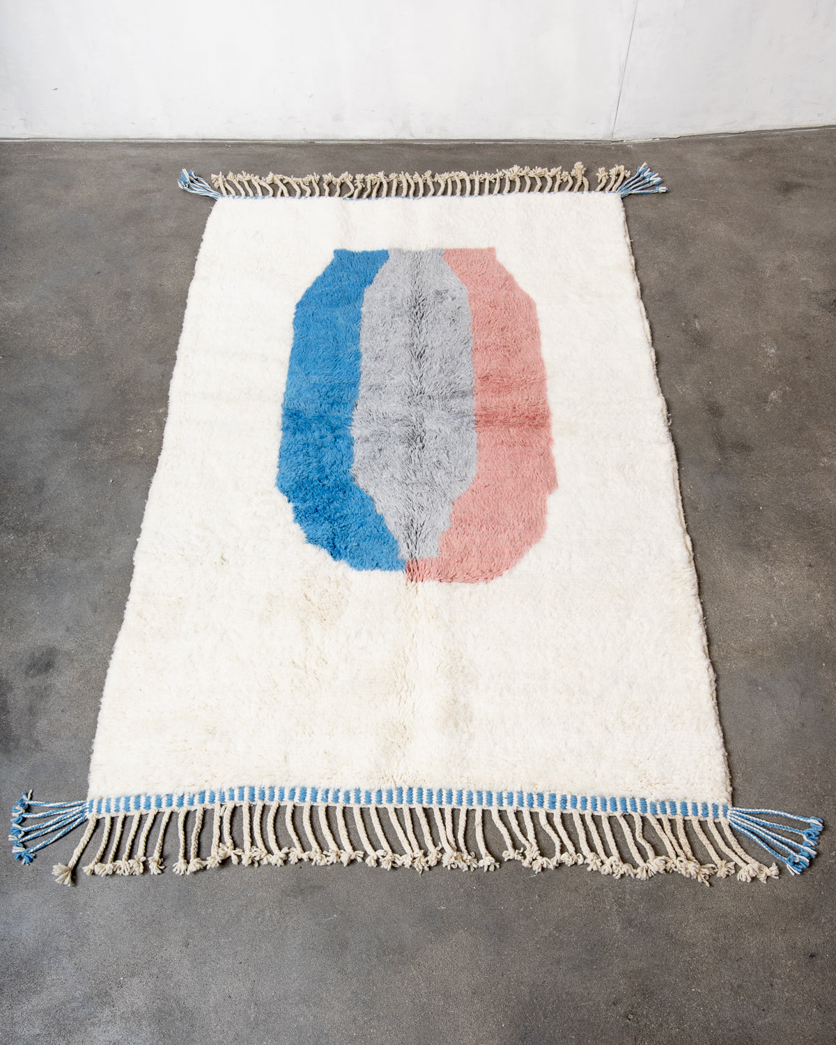 Modern, designer, handcrafted Berber rug from Morocco. Beniourain carpet with beautiful colours and patterns and fluffy wool texture.